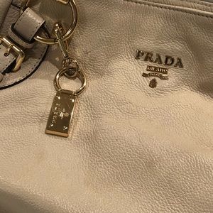 Cream color Prada bag